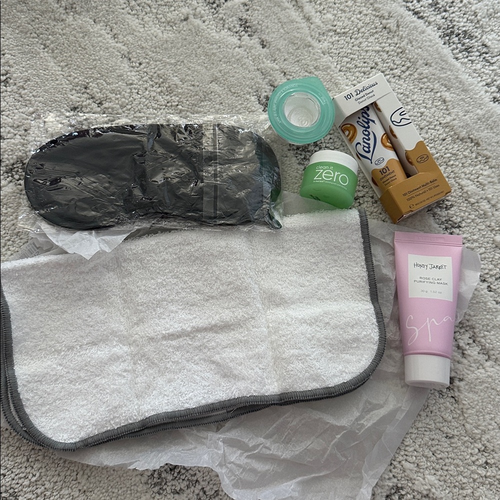 Lanolips glazed donut balm along with a rose mask, balm, and Tony moly lip melt